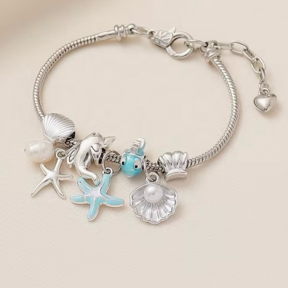 HOST PICK  Dolphin and Starfish Charm Bracelet with Sea Life Accents